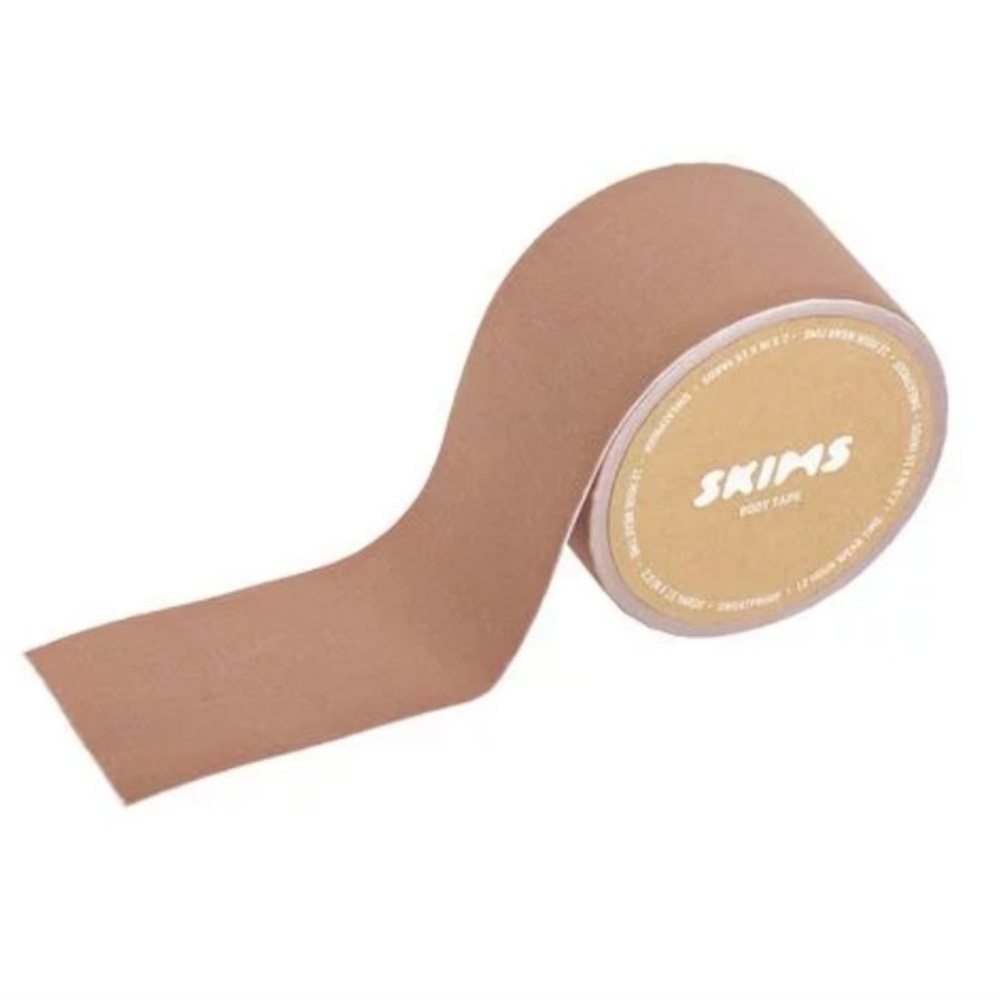 NWT SKIMS BODY TAPE  
TIGERS EYE / FITS ALL. Never been used.